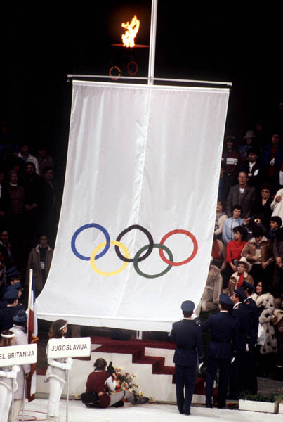 The Olympic flag is raised during the opening ceremony of the 1984 winter Olympic Games in Sarajevo. (CP Photo/ COA/J. Merrithew)