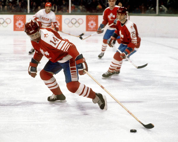 Canada's Darren Lowe (#14) and Bruce Driver (#25) competing in the hockey event against the USSR at the 1984 Winter Olympics in Sarajevo. (CP PHOTO/ COA/O. Bierwagon )