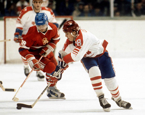 Canada's Russ Courtnall (#18) competes in hockey action against Czechoslovakia at the 1984 Winter Olympics in Sarajevo. (CP PHOTO/ COA/O. Bierwagon )