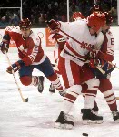 Canada's Dave Donnelly (#23) and Robin Bartel (#2) defend their territory during hockey action against Sweden at the 1984 Winter Olympics in Sarajevo. (CP PHOTO/ COA/O. Bierwagon )