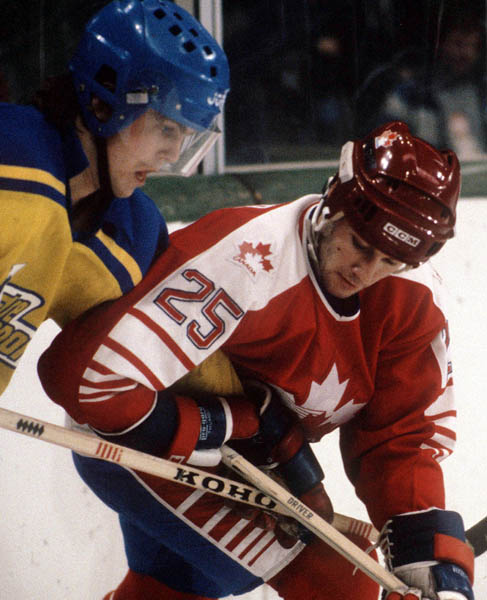 Bruce Driver competes in hockey action against Sweden at the 1984 Winter Olympics in Sarajevo. (CP PHOTO/ COA/O. Bierwagon )