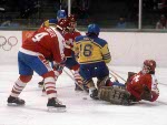 Canada's Doug Lidster (left) and Mario Gosselin (goalie) look helplessly as Team Sweden score during hockey action at the 1984 Winter Olympics in Sarajevo. (CP PHOTO/ COA/O. Bierwagon )