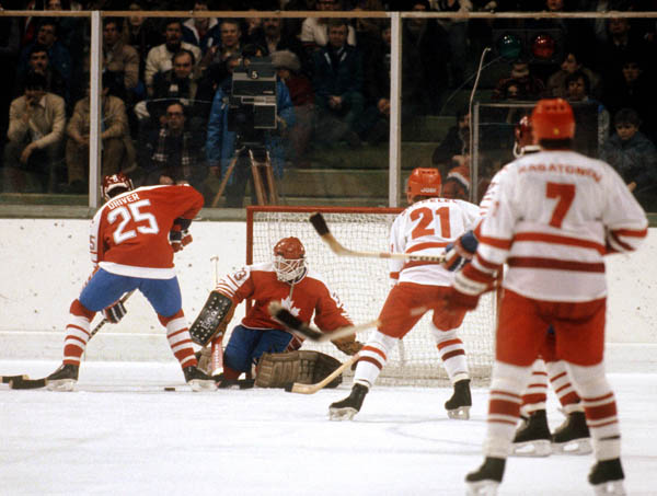 Canada's Bruce Driver (#25) and goalie Mario Gosselin compete in the hockey event against the USSR at the 1984 Winter Olympics in Sarajevo. (CP PHOTO/ COA/O. Bierwagon )