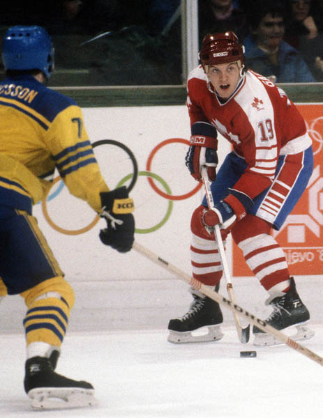 Canada's Dave Gagner looks to make a pass during hockey action against Swede  at the 1984 Winter Olympics in Sarajevo. (CP PHOTO/ COA/O. Bierwagon )
