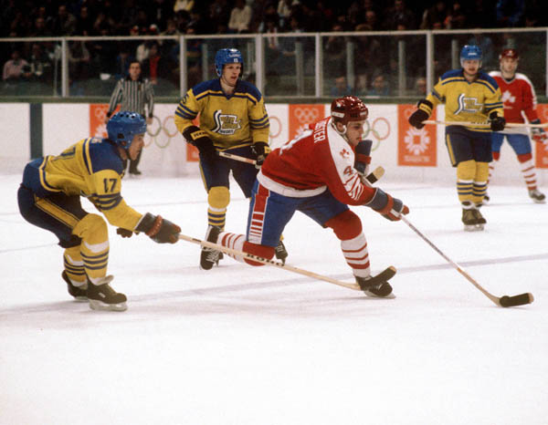 Canada's Doug Lidster (#4) competes in hockey action against Sweden at the 1984 Winter Olympics in Sarajevo. (CP PHOTO/ COA/O. Bierwagon)