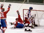 Canada's Bruce Driver (right) competes in hockey action against the United States at the 1984 Winter Olympics in Sarajevo. (CP PHOTO/ COA/O. Bierwagon )