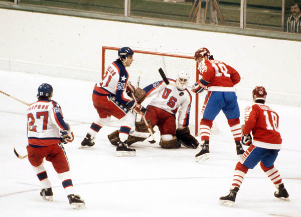 Canada's Dave Gagner and Russ Courtnall (right) put the pressure on during hockey action against the United States at the 1984 Winter Olympics in Sarajevo. (CP PHOTO/ COA/O. Bierwagon )