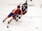Canada's Mario Gosselin covers the angles as Robin Bartel (2) covers a United States player during hockey action at the 1984 Winter Olympics in Sarajevo. (CP PHOTO/ COA/O. Bierwagon )