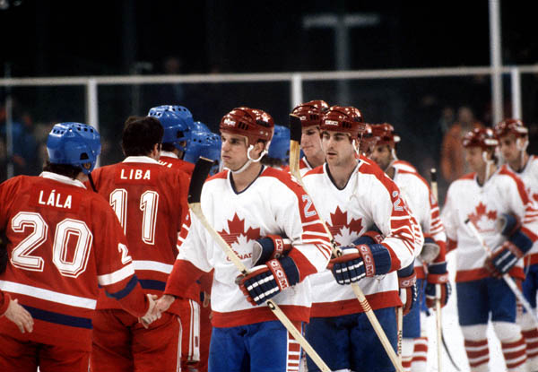 Team Canada congratulates the players from Czechoslovakia during hockey action  at the 1984 Winter Olympics in Sarajevo. (CP PHOTO/ COA/O. Bierwagon )