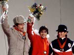 Canada's Gaetan Boucher (centre) celebrates after winning the gold medal in a speed skating event at the 1984 Winter Olympics in Sarajevo. (CP PHOTO/ COA/O. Bierwagon)