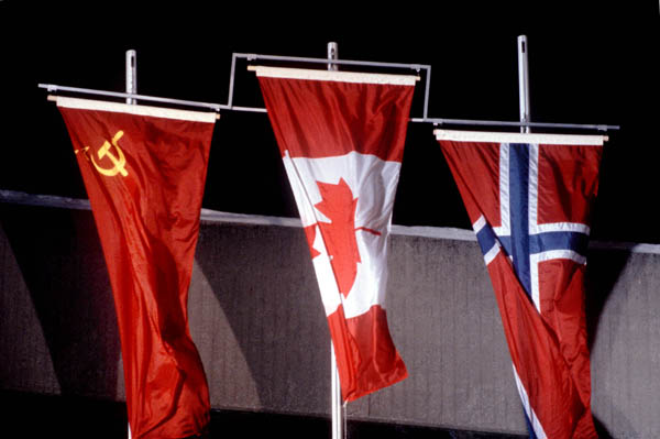 The Canadian flag is raised during the medal presentation ceremony in honor of Gaetan Boucher's gold medal win in a speed skating event at the 1984 Winter Olympics in Sarajevo. (CP Photo/COA/O. Bierwagon)