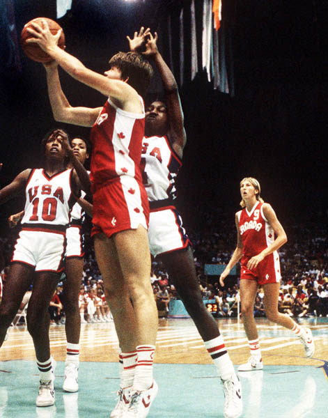 Canada's Bev Smith (left) jumps for a shot during women's basketball action at the 1984 Olympic Games in Los Angeles. (CP PHOTO/COA/JM)