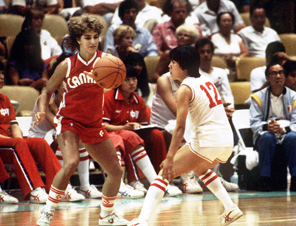 Canada's Lynn Polson (left) reaches for the ball during women's basketball action at the 1984 Olympic Games in Los Angeles. (CP PHOTO/COA/JM)