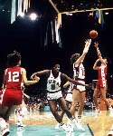 Canada's Debbie Huband (right) shoots for the hoop during women's basketball action at the 1984 Olympic Games in Los Angeles. (CP PHOTO/COA/JM)