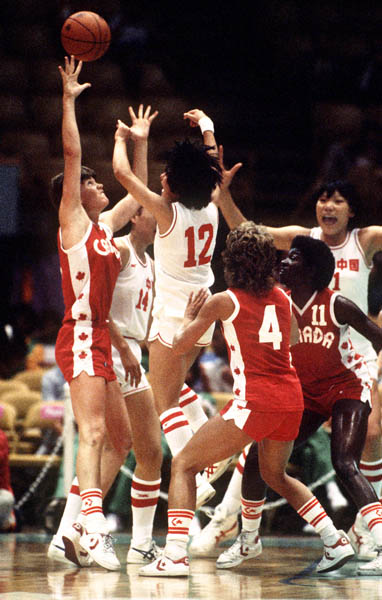 Canada's Bev Smith (left) throws during women's basketball action at the 1984 Olympic Games in Los Angeles. (CP PHOTO/COA/JM)