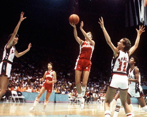 Canada's Misty Thomas (centre) does a lay-up during women's basketball action at the 1984 Olympic Games in Los Angeles. (CP PHOTO/COA/JM)