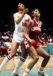Canada's Misty Thomas (right) avoids an opponent during women's basketball action at the 1984 Olympic Games in Los Angeles. (CP PHOTO/COA/JM)