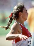 Canada's France Gareau (left) and Angella Taylor compete in a relay race during athletics competiton at the 1984 Olympic games in Los Angeles. (CP PHOTO/ COA/JM)