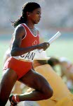 Canada's Jillian Richardson (left), Molly Killingbeck, and Marita Payne-Wiggins competing in the 4x400m relay event at the 1988 Olympic games in Seoul. (CP PHOTO/ COA/F.S.Grant)