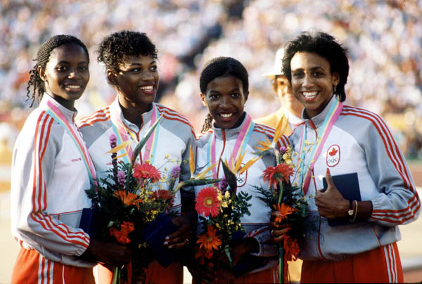 Canada's Marita Payne, Jillian Richardson, Molly Killingbeck and Charmaine Crooks celebrate their silver medal win in the 4x400m relay event at the 1984 Olympic games in Los Angeles. (CP PHOTO/ COA/Crombie McNeil)