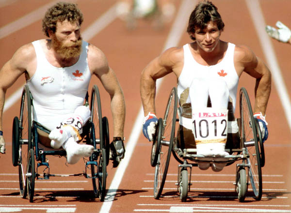 Canada's Mel Fitzgerald (left) and Rick Hansen compete in the wheelchair event at the 1984 Olympic games in Los Angeles. (CP PHOTO/ COA/J Merrithew)