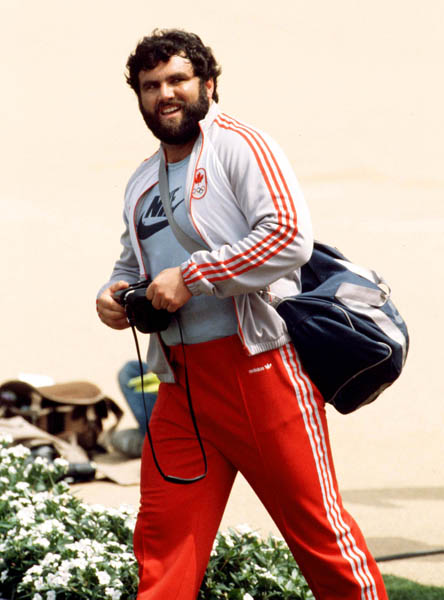 Canada's Rob Gray collects souvenirs at the 1984 Olympic games in Los Angeles. (CP PHOTO/ COA/JM)