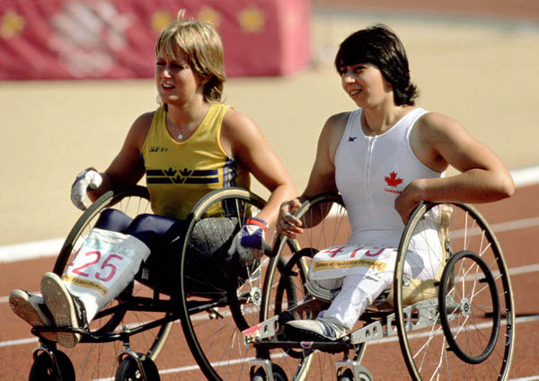 Canada's Angela Leriti (right) competes in the wheelchair event at the 1984 Olympic games in Los Angeles. (CP PHOTO/ COA/J Merrithew )