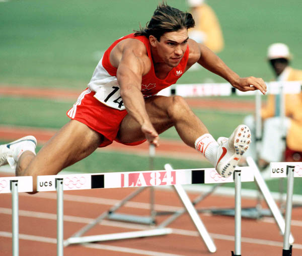 Canada's Dave Steen clears a hurdle during decathlon competition at the 1984 Olympic games in Los Angeles. (CP PHOTO/ COA/JM)