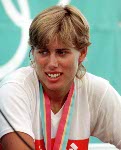 Canada's Silken Laumann waves to the crowd from the winners podium at the 1996 Atlanta Summer Olympic Games. (CP PHOTO/COA/Mike Ridewood)