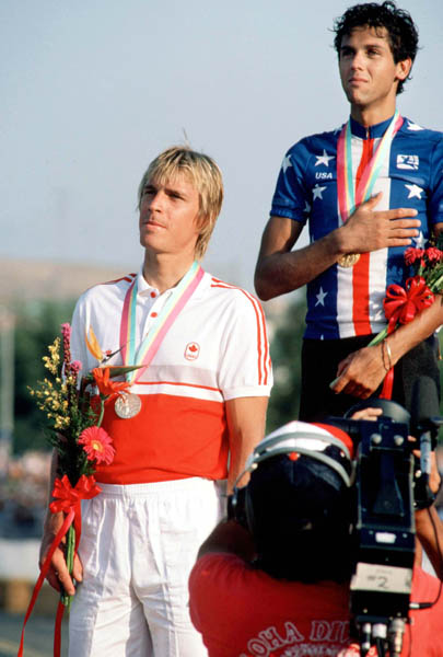 Canada's Steve Bauer (left) celebrates a silver medal win in the cycling event at the 1984 Olympic games in Los Angeles. (CP PHOTO/ COA/)