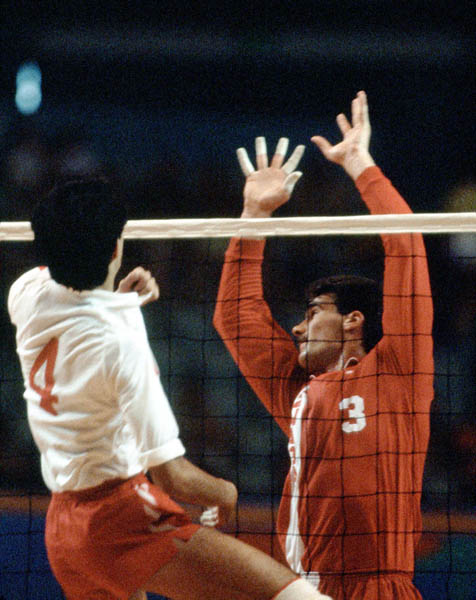 Canada's John Barrett (right) competes in the men's volleyball event at the 1984 Los Angeles Summer Olympic Games. (CP PHOTO/COA/Scott Grant)
