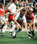 Canada's Pat Burrows (left) plays field hockey at the 1988 Seoul Olympic Games. (CP Photo/ COA/ T. Grant)