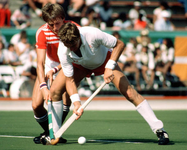 Canada's Pat Burrows (front) plays field hockey at the 1984 Los Angeles Olympic Games. (CP Photo/ COA/ Ted Grant)