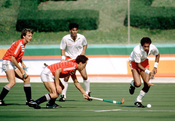 Canada's Satinder Chohan (centre) and Aaron Fernandes (right) play field hockey at the 1984 Los Angeles Olympic Games. (CP Photo/ COA/ Ted Grant)