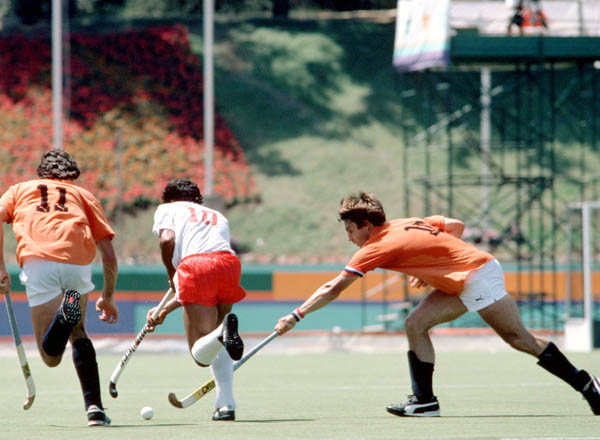 Canada's Satinder Chohan (centre) plays field hockey at the 1984 Los Angeles Olympic Games. (CP Photo/ COA/ Ted Grant)