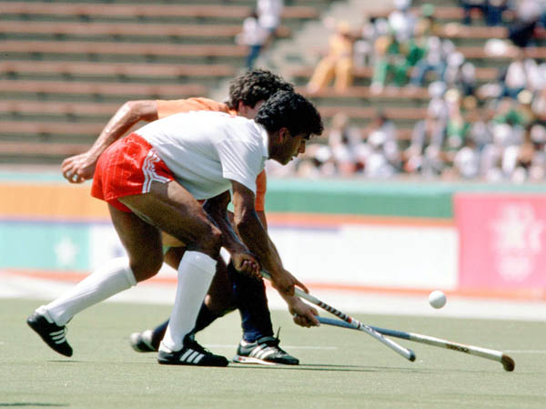Canada's Satinder Chohan (foreground) plays field hockey at the 1984 Los Angeles Olympic Games. (CP Photo/ COA/ Ted Grant)