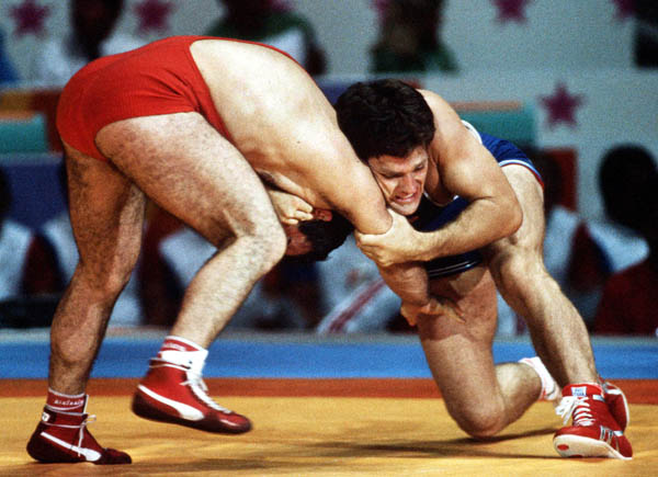 Canada's Clark Davis (right) competes in the wrestling event at the 1984 Olympic games in Los Angeles. (CP PHOTO/COA/Crombie McNeil)