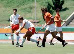 Canada's Pat Burrows (left) plays field hockey at the 1988 Seoul Olympic Games. (CP Photo/ COA/ T. Grant)