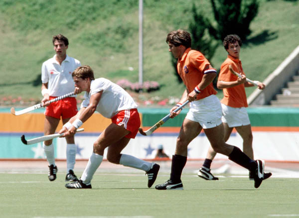 (Left) Canada's Kipling Hladky and Pat Burrows play field hockey at the 1984 Los Angeles Olympic Games. (CP Photo/ COA/ Ted Grant)