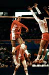 Canada's Garth Pischke (left) and Al Coulter (behind) compete in the men's volleyball event at the 1984 Los Angeles Summer Olympic Games. (CP PHOTO/COA/Scott Grant)