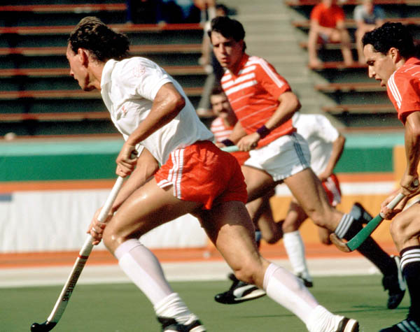 Canada's Ross Rutledge (left) plays field hockey at the 1984 Los Angeles Olympic Games. (CP Photo/ COA/ Ted Grant)