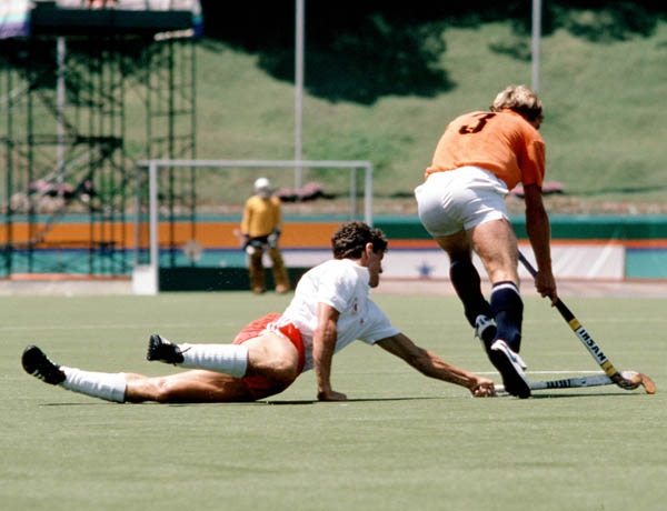 Canada's Rob Smith (left) plays field hockey at the 1984 Los Angeles Olympic Games. (CP Photo/ COA/ Ted Grant)
