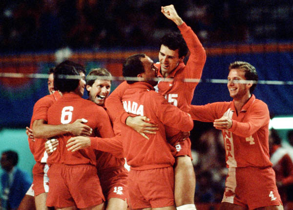 Canadian men's volleyball team celebrates a win at the 1984 Los Angeles Summer Olympic Games. (CP PHOTO/COA/Scott Grant)