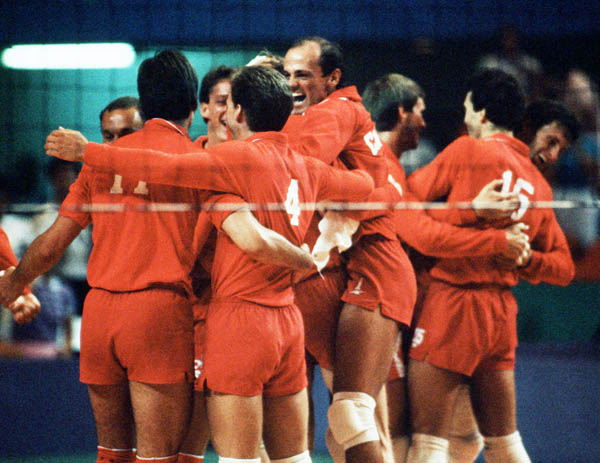Canadian men's volleyball team celebrates a win at the 1984 Los Angeles Summer Olympic Games. (CP PHOTO/COA/Scott Grant)