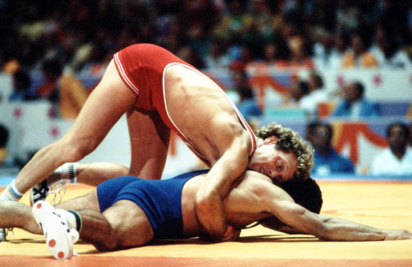 Canada's Doug Yeats (red) competes in the Greco Roman wrestling event at the 1984 Olympic games in Los Angeles. (CP PHOTO/COA/Crombie McNeil)