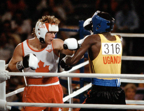 Canada's Willie Dewit (left) competes in a boxing event at the 1984 Olympic games in Los Angeles. (CP PHOTO/ COA/ Tim O'lett)