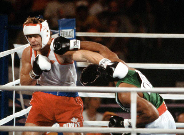 Canada's Willie Dewit (left) competes in the boxing event at the 1984 Olympic games in Los Angeles. (CP PHOTO/ COA/ Tim O'lett)
