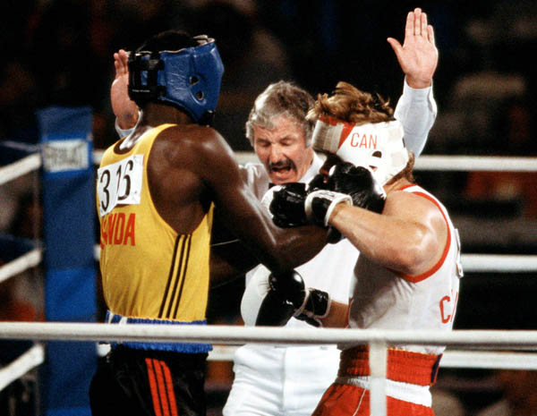Canada's Willie Dewit (right) competes in the boxing event at the 1984 Olympic games in Los Angeles. (CP PHOTO/ COA/ Tim O'lett)
