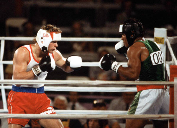 Canada's Willie Dewit (left) competing in the boxing event at the 1984 Olympic games in Los Angeles. (CP PHOTO/ COA/ Tim O'lett)
