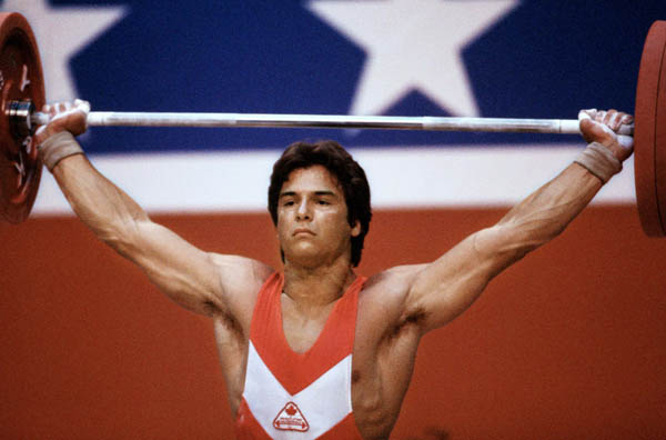 Canada's Denis Garon competes in the weightlifting event at the 1984 Olympic games in Los Angeles. (CP PHOTO/ COA/Tim O'lett )